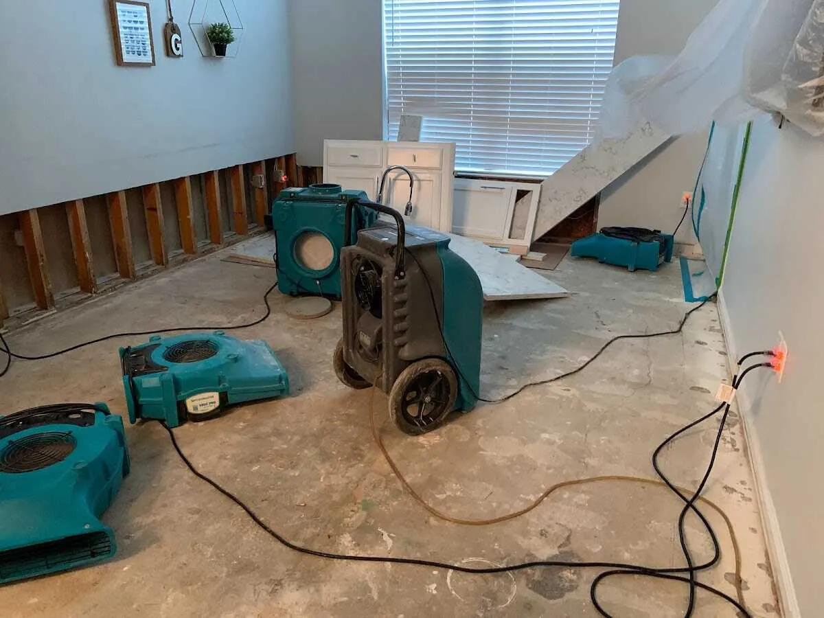 Dehumidifier in flood-cut room for Water Damage Restoration in Barrington